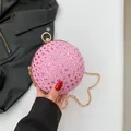 Pink spherical woven evening bag with sequins and a gold chain strap for crossbody wear - Pink