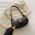 Classic black crescent shoulder bag in matte PU leather with gold flower metal buckle - Black