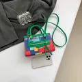 Mini crossbody bag with multicolor geometric pattern and green leather trim handles - Green