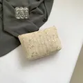 Chic beige woven clutch with floral embroidery and top zipper closure for summer - White