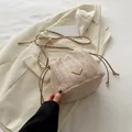 Beige woven straw bucket bag with contrasting chain strap and gold triangle metal plate - With Pendant / Khaki