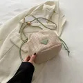 Contrast color woven bucket bag in beige and green featuring a gold chain strap - With Pendant / Green