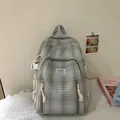 Zaino in cotone e lino a quadri grigio e bianco con nappe crema e spallacci - Grigio