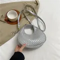Silver crescent bag with woven texture and adjustable shoulder strap for women - Silver