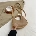 Khaki crescent moon handbag with woven faux leather texture and adjustable strap - Khaki