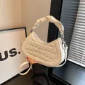 White quilted crescent handbag with pleated handle and silver hardware detail - Off White