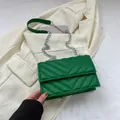 Green chevron quilted crossbody bag with silver chain strap and leather shoulder pad - Green