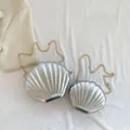 Silver shell-shaped crossbody bags with metallic texture and gold chain straps - Large / Silver