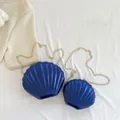 Metallic deep blue shell-shaped crossbody bags with gold chain straps in two sizes - Blue