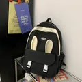 Fashionable black canvas backpack with cream rabbit ears and large capacity for school - Black