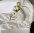 Colorful woven bucket bag with lace bow and pearl accent on soft white background - With Scarf Style / Colorful