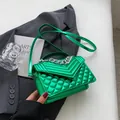 Metallic green quilted square bag with silver chain handle and thin crossbody strap - Green