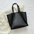 Bolso tote grande negro de estilo minimalista en piel sintética con asas largas - Negro