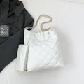 White quilted tote bag with diamond pattern and matching mini pouch for daily casual use - White