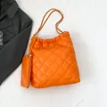 Orange quilted tote bag with large diamond pattern and chain strap for women - Orange