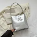 Metallic silver underarm bucket bag with embossed optimism lettering and褶皱 texture - Letter Style / Silver