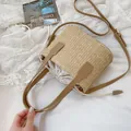 Borsa a tracolla alla moda in paglia beige con cinturino in pelle marrone e coulisse - Cachi