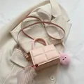 Pink quilted square bag with adjustable shoulder strap and cute plush charm pendant - Pink