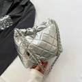 Silver quilted chain bucket bag with metallic finish and cloud-shaped褶皱 texture design - Silver