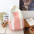 Pink and beige large-capacity student backpack with a round fashion patch and side pockets - Pink