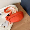 Sporty bright orange waterproof chest bag with black zipper and adjustable buckle strap - Orange