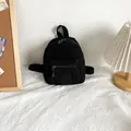 Mini black corduroy backpack for women featuring a minimalist ribbed texture design - Black