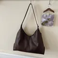 Minimalist large dark coffee tote bag in soft PU leather with vertical stitching detail - Brown