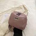 Pink nylon crossbody bag with dual zippers and adjustable strap for women travel use - Khaki