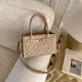Elegant beige crossbody bag with quilted diamond pattern and metallic silver clasp - Khaki