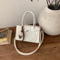 White crossbody bag with diamond lattice embossing and cute ice cream charm detail - White With Pendant