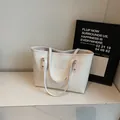 White large capacity tote bag with embossed floral texture and metal logo plaque - Basic Style / Off White