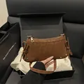 Brown leopard print shoulder bag with suede texture and decorative side ribbons - Brown
