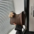 Coffee brown faux leather bucket bag with fashion tag and plush bear charm pendant - Star Charm / Brown