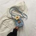 Blue floral jacquard mini crossbody phone bag with yellow sunflower charm and chic strap - Blue