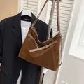 Caramel brown suede tote bag featuring ribbon tie details and a spacious interior design - Brown