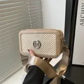 Chic beige woven crossbody bag with silver M logo and wide adjustable shoulder strap - Khaki
