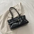 Chic black oil-wax leather shoulder bag with gold buckle and vintage pleated texture - Black