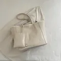 Elegant beige faux leather tote bag with subtle leopard print and matching pouch - White