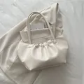 Minimalist beige pleated tote bag in soft leather with thin shoulder straps - White