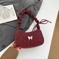 Burgundy leopard print handbag with silver bow buckle and pleated handle detail - Red