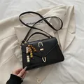 Chic black crocodile embossed mini handbag with beaded tassel and long shoulder strap - With Pendant / Black