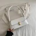 French style white baguette bag with gold metal clasp and minimalist leather finish - White