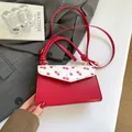 Red cherry print crossbody bag with white patterned flap and red shoulder strap - Cherry Style / Red