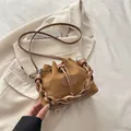 Brown suede bucket bag with woven handle and drawstring closure for women - Brown