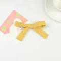Classic bright yellow fabric bow hair clip for girls with a soft cotton texture - Yellow