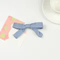 Elegant misty blue fabric bow hair clip for girls with a matte cotton texture - Blue