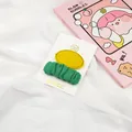 Detail of handmade fabric hair clips set with yellow embroidery and green pleated design - Ginger/Dark Green