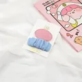 Detail of pink and blue fabric hair clips on a white card over soft silk fabric - Korean Pink/Light Blue