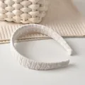 Bandeau chic en maille torsadée blanc crème avec un design tressé texturé minimaliste - Serre-tête / Beige