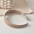 Bandeau en tricot kaki avec motif de tresse épaisse et texture textile douce pour femme - Serre-tête / Café au Lait